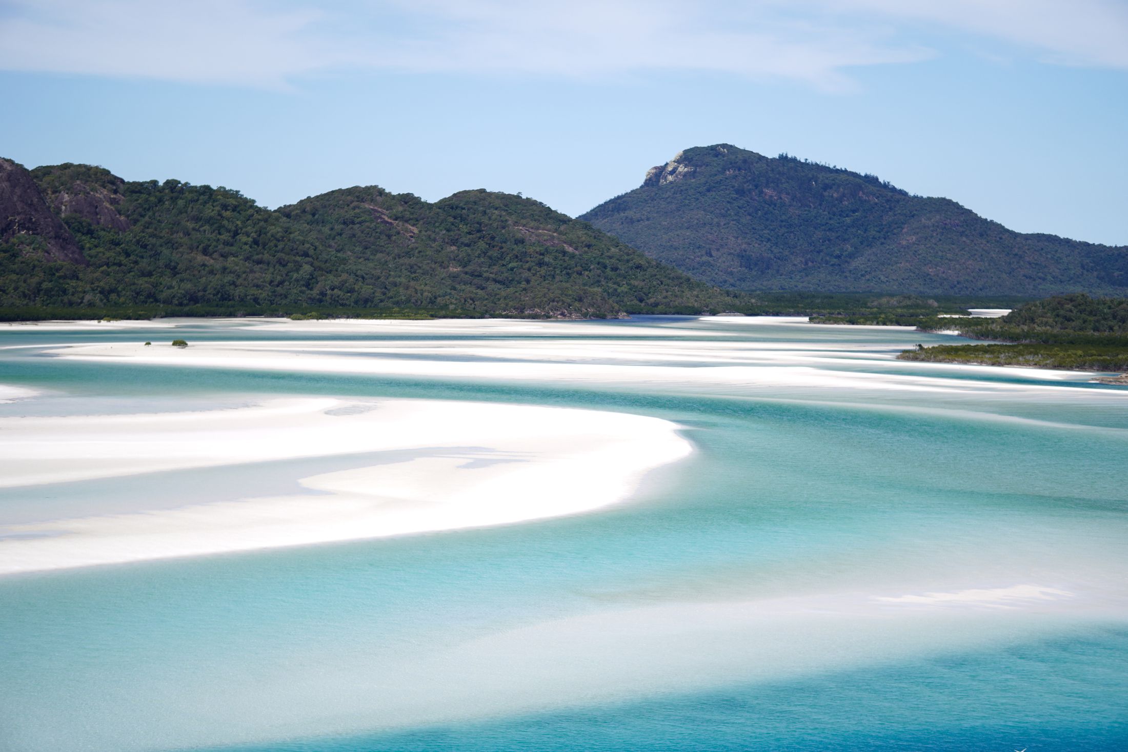 Swirling white sand and turquoise water at Hill Inlet in the Whitsundays