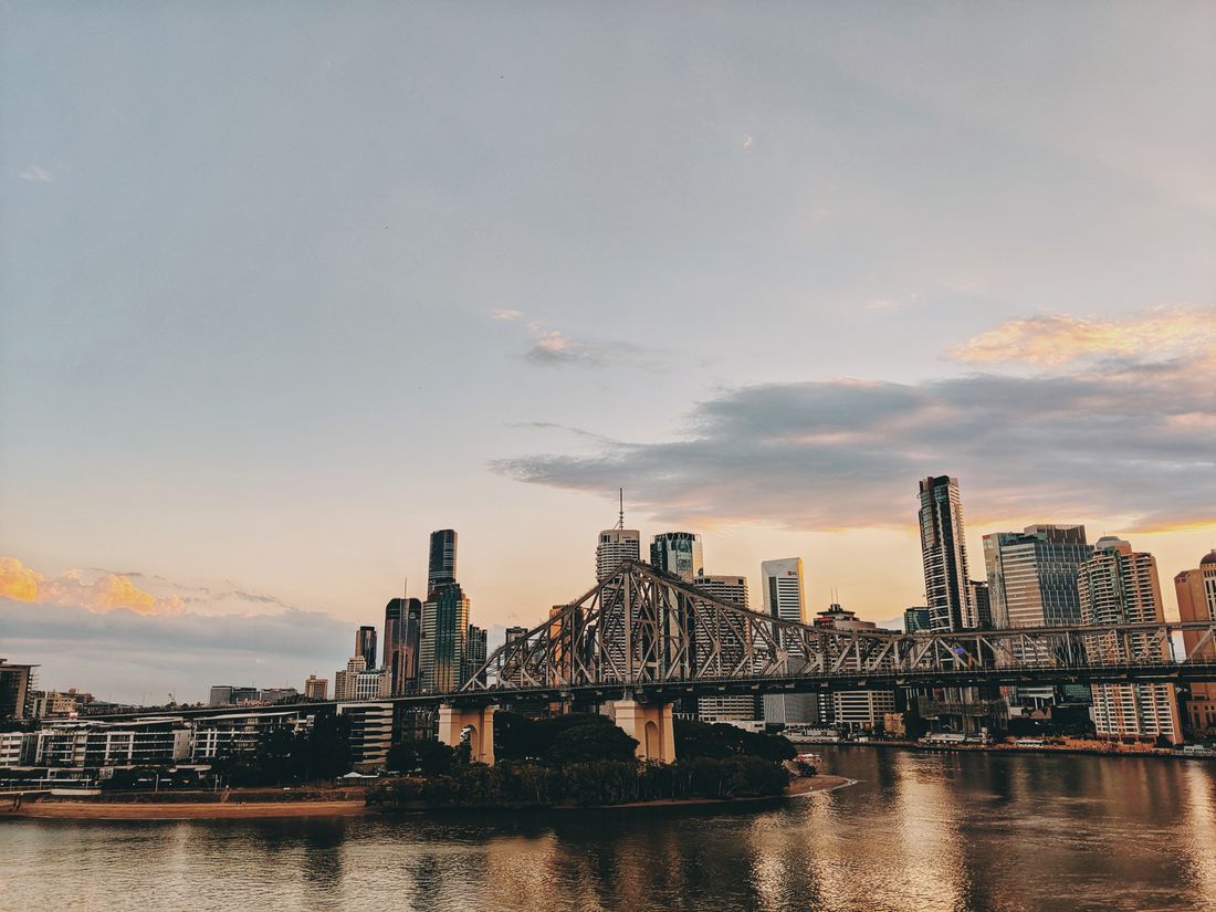 Brisbane's Story Bridge and city towers at golden hour